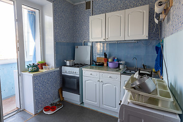 Image showing The interior of the old kitchen with access to the balcony