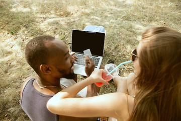 Image showing Young multiethnic international couple outdoors