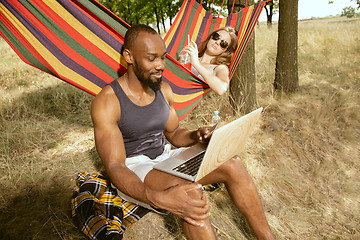 Image showing Young multiethnic international couple outdoors