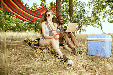 Image showing Young multiethnic international couple outdoors