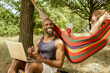 Image showing Young multiethnic international couple outdoors