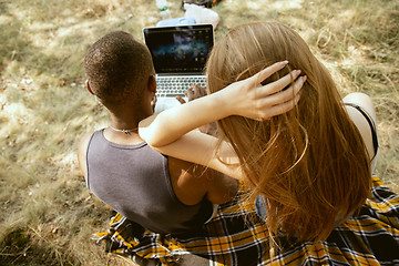 Image showing Young multiethnic international couple outdoors