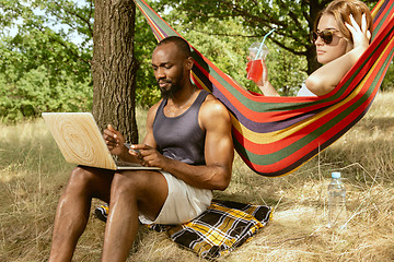 Image showing Young multiethnic international couple outdoors