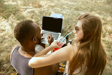 Image showing Young multiethnic international couple outdoors