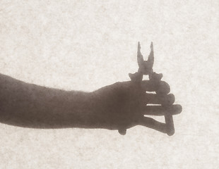 Image showing Silhouette behind a transparent paper