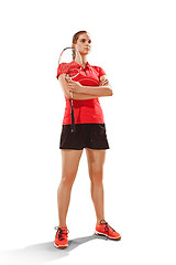 Image showing Young woman badminton player standing over white background