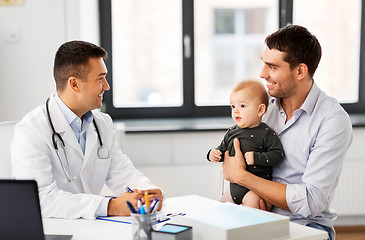 Image showing father with baby and doctor at clinic