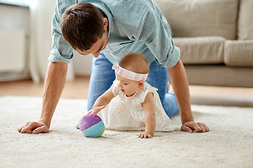 Image showing father and little baby daughter with ball at home