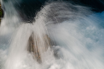 Image showing single stone in wild river