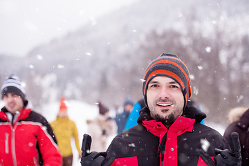 Image showing portrait of young man in beautiful winter landscape