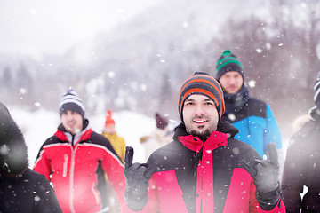 Image showing portrait of young man in beautiful winter landscape