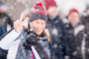 Image showing Abstract blurred photo of young woman in beautiful winter landsc