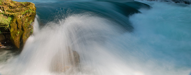 Image showing single stone in wild river