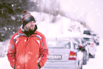 Image showing Portrait of young man on snowy winter day