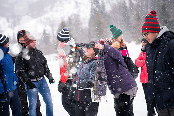 Image showing group of young people having blindfolded games competition