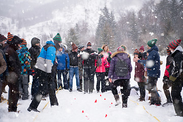 Image showing group of young people having blindfolded games competition