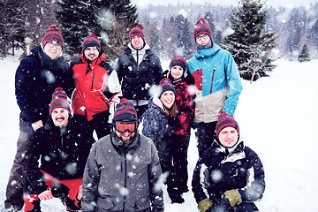 Image showing portrait of group young people in beautiful winter landscape