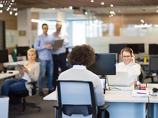 Image showing businessman working using a laptop in startup office