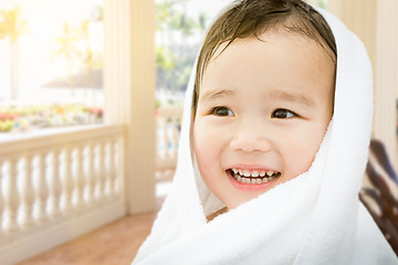 Image showing Happy Cute Mixed Race Chinese and Caucasian Boy On Tropical Pati