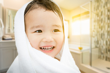 Image showing Happy Cute Mixed Race Chinese and Caucasian Boy In Bathroom Wrap