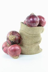 Image showing Red onion in burlap bag 
