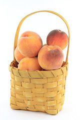 Image showing Peaches in basket. 