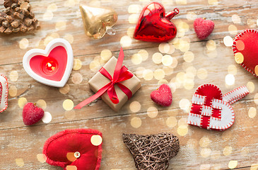 Image showing christmas gift, heart shaped decorations, candle