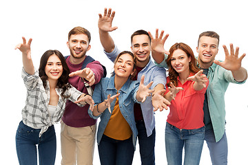 Image showing group of happy students over white background