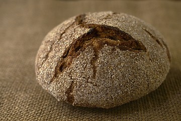 Image showing traditional finnish rye bread on burlap