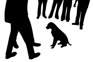 Image showing Dog sitting and people around dog