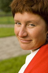 Image showing redhead woman in red