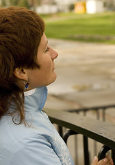 Image showing redhead woman on the bridge