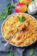 Image showing Homemade apple crumble with cinnamon.