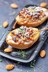 Image showing Pears baked in honey with raisins and nuts.