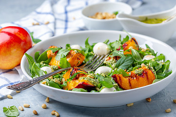 Image showing Arugula salad with grilled nectarines.