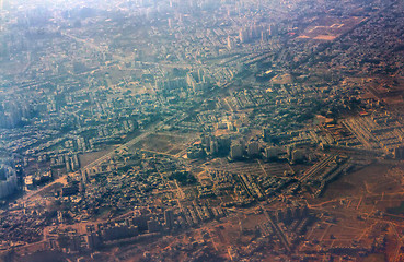 Image showing Journey by air. A view of city from plane.