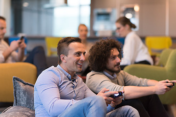 Image showing startup Office Workers Playing computer games