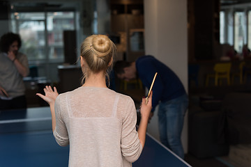 Image showing startup business team playing ping pong tennis