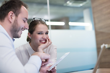 Image showing Business People Working With Tablet in startup office