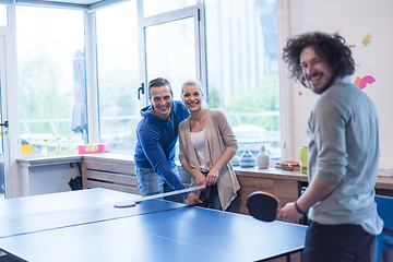 Image showing startup business team playing ping pong tennis