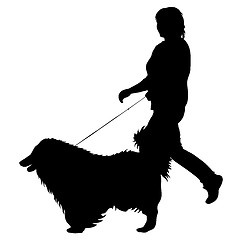 Image showing Silhouette of woman and dog on a white background