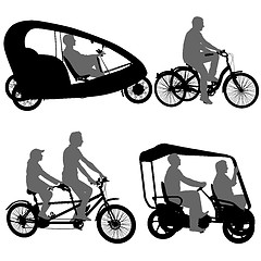 Image showing Set silhouette of two athletes on tandem bicycle on white background