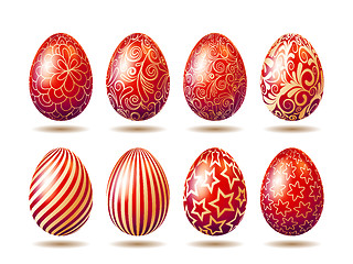 Image showing Set of Easter bright red eggs with golden ornament