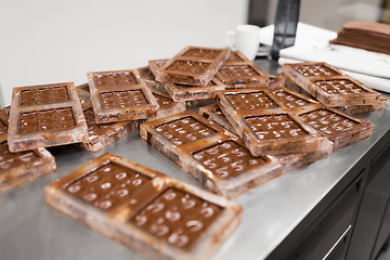 Image showing chocolate in candy molds at confectionery shop