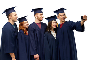 Image showing graduates taking selfie by smartphone