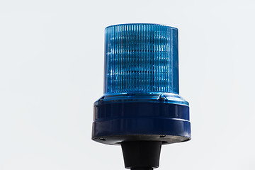 Image showing Detail shot of a blue light on a police car