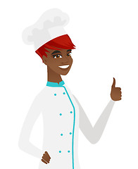 Image showing Young african-american chef giving thumb up.