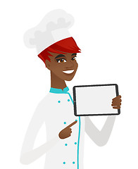Image showing Smiling chef cook holding tablet computer.