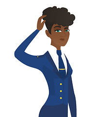 Image showing Young african-american stewardess scratching head.