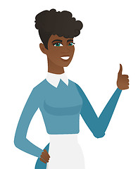 Image showing Young african-american cleaner giving thumb up.